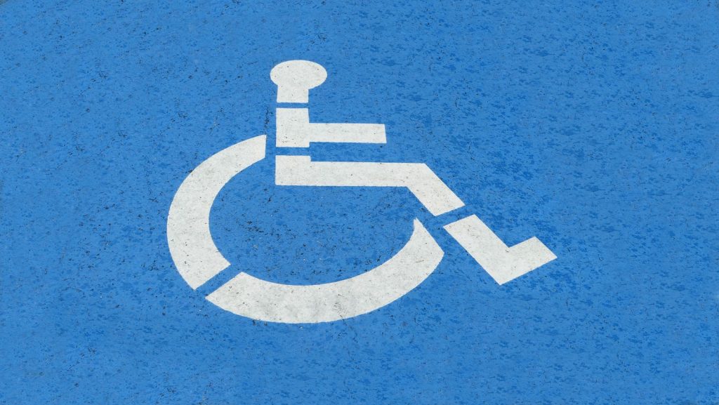 Clean blue accessible parking-space marking in Baton Rouge